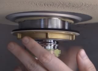 stuck bathroom sink drain