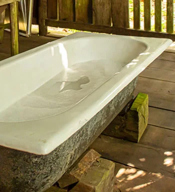 How To Unclog a Bathtub Drain With Standing Water